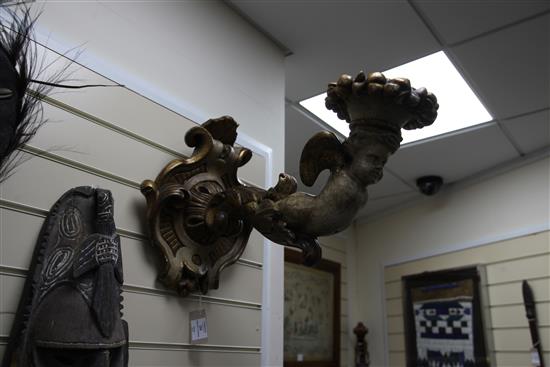 A pair of 19th century Italian carved and painted parcel gilt wall scones, 20in.